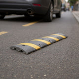 SILYMX black recycled rubber speed bump with 5 yellow reflective stripes, 183cm long, for traffic control.