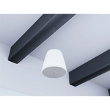 SILYMX Designmax 10-inch white pendant subwoofer hanging from a modern ceiling with black beams